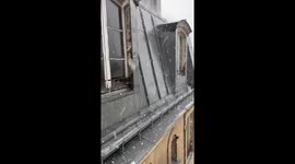 Hailstones batter townhouses during storm in Paris