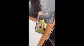 Phone explodes under man's bed while he sleeps