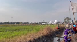 DIY rockets roar along clotheslines at Buddhist festival