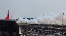 Homemade rockets roar along clotheslines at Buddhist festival