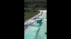 Woman accidentally hits passerby while sliding into pool in Maputo, Mozambique