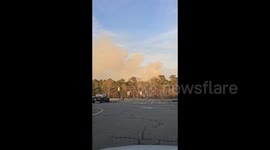 US: Smoke from Brush Fire on Joint Base Cape Cod is seen over Bourne