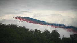 The Red Arrows fly  over Chelsea when returning to base after the VE day fly past