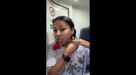 Bus door opens as person ties hair on moving vehicle in Mexico City