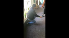 Girl pranks her co-workers with snake can and enjoys their reactions