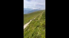 Biker attempts risky jump but suffers a gnarly fall after making a major mistake mid-air