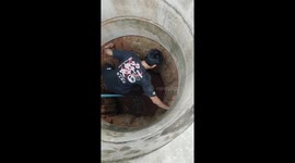 Pet dog trapped in 20ft deep well is rescued in Thailand