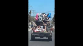 Overloaded pickup truck carries beachgoers in Quezon Province