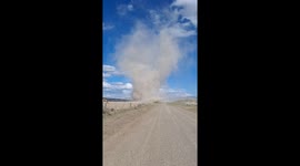 What driving through a massive dirt devil looks like