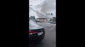 Hero driver pulls burning car away from petrol station