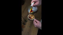 In this video i‘m preparing 4 cappuccinos. Unique ones. Colourful swans tulips hearts & rosettas. U see me throwing up some cups and change the perspective on how i do them. But there’s a secret. How I put the colours on top of the milk and what kind of c