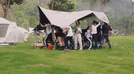 Campers cling to canopy as storm smashes into park in China