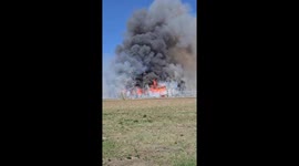 Thick black smoke rises from brush fire in Edmonton, Canada