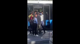 Crowded bus prevents passengers from boarding in Madrid, Spain