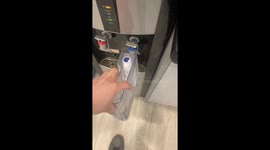 Person catches falling cup with leg in Moscow