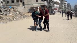 Israeli airstrike on crowded street in Gaza kills at least 22 civilians (3)