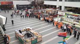 VE Day, Commuters and workers reflect at Birmingham New Street Station during 2 minute silence
