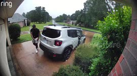 Woman Runs Into Garage Door While Trying to Protect Hair