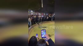 France: PSG Fan Jumping Into Fountain After Champions League Win Over Arsenal