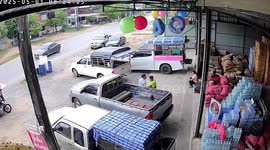 Unmanned parked pickup truck rolls down road