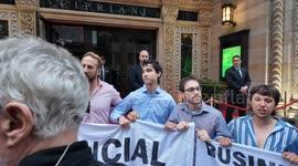 Demonstrators are shown blocking the entrance to Cipriani's restaurant in New York