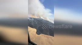 Firefighting plane tackles blaze in Fresno, California