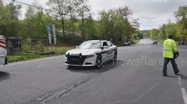 Mount Carmel Township Police take off after a driver goes straight through an accident scene