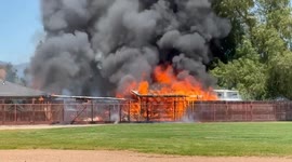 US, Los Angeles: Fontana Structure Ablaze Near Fontana Schools