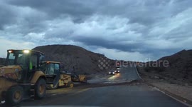 Road crews worked to make roads safe in Bullhead City, Arizona, after thunderstorms cause flash flooding