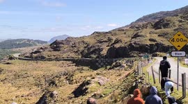 Rally car crashes through guard rail and nearly falls into valley in Ireland