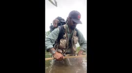 Father catches and releases trout with daughter on back in Broken Bow, Oklahoma