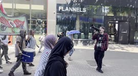 Palestine protestors marching in Sutton, London