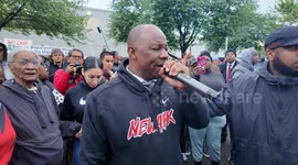 Demonstrators appear out a federal holding facility in Newark,  New Jersey waiting for the release of Newark Mayor Ras J. Baraka
