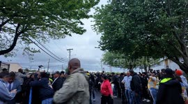 Demonstrators appear out a federal holding facility in Newark,  New Jersey waiting for the release of Newark Mayor Ras J. Baraka