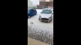 Hail blankets roads as storms hit eastern Spain