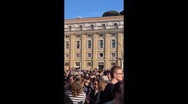 The moment white smoke appeared over the Sistine Chapel, people ran outside