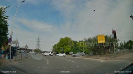 Near Miss: Terrifying Near Miss Caught on Camera: Mobility Scooter vs. Oncoming Car at Busy Junction in Birmingham