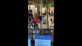 Daughter Not Impressed With Carousel Ride