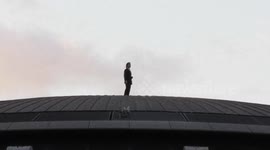Tom Cruise gets insulted by a member of the public as he takes part in a publicity stunt on top of the BFI IMAX late Sunday night to promote his new Mission: Impossible film