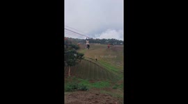 Staff rescue terrified woman stuck on 'Sky Cycle' zip line ride