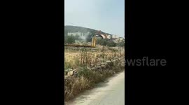 Israeli bulldozers near the town of Dura, south of the West Bank