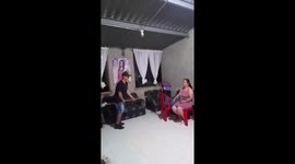 Mother reacts after broom breaks during surprise dance in Piendamó, Cauca, Colombia