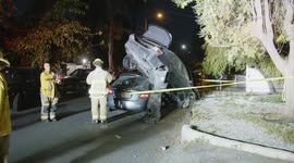 US, Los Angeles: Reseda Car Lands On Parked Vehicle in Crash