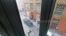 Freak Hail storm in London. Weather crazy snow Central London