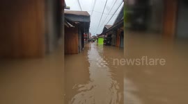 Indonesia: Floodwaters Swamp Homes in Loa Janan, Indonesia