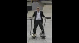 A Guy Rides Vacuum Roller Skates