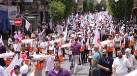 Silent funeral procession held in West Bank to honor Palestinian medics killed in Gaza