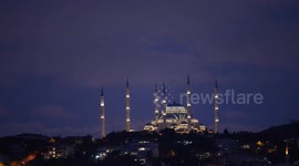 Türkiye: Full moon rises over Camlica Mosque in Istanbul