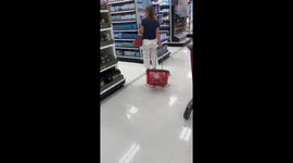 Shopper Drags Basket Around