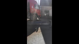 Truck climbs ramp but ends with flat tire in Shanxi, China